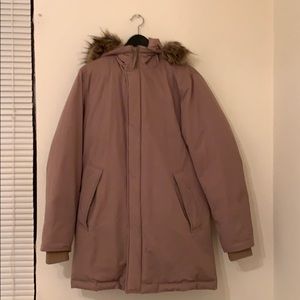 Beige long padded coat with fur on the hood